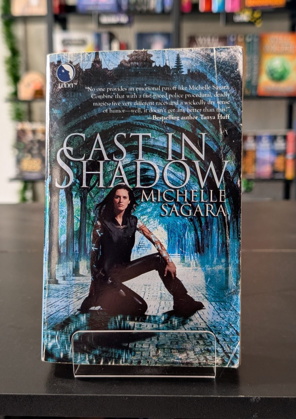 Cast in Shadow (Chronicles of Elantra Novel #1)